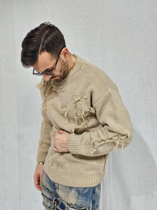 Maglione filo trama sabbiato